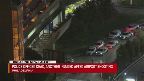 Shooting at Philadelphia International Airport garage kills 1 police officer and wounds another